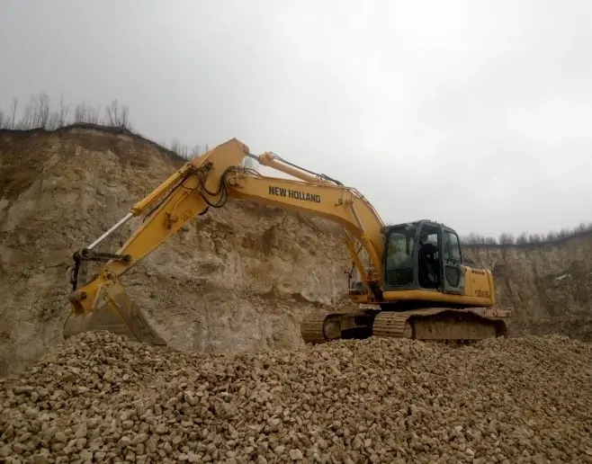 Послуги гусеничного екскаватора NEW HOLLAND E245B