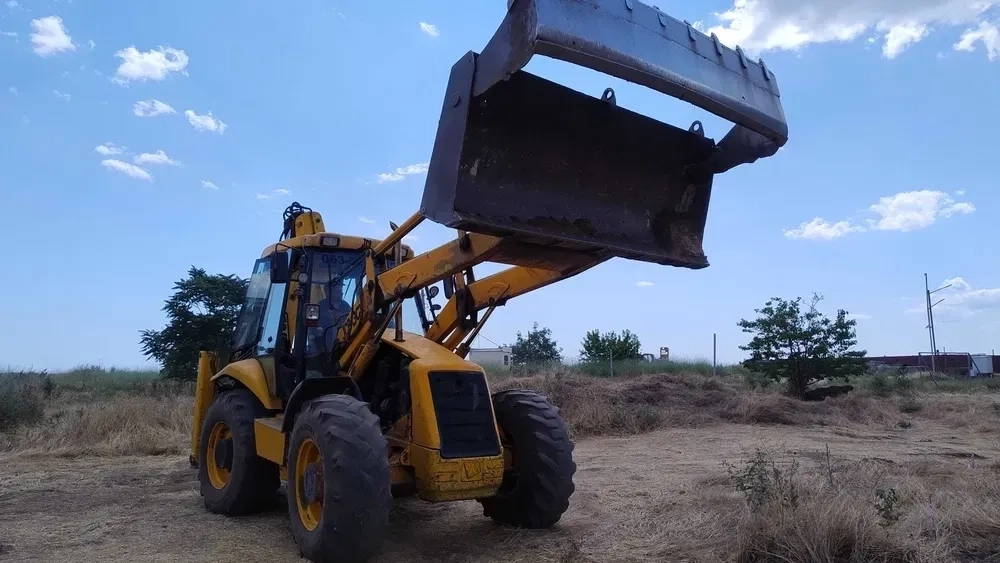 Екскаватор - навантажувач JCB 3CX/4 CX