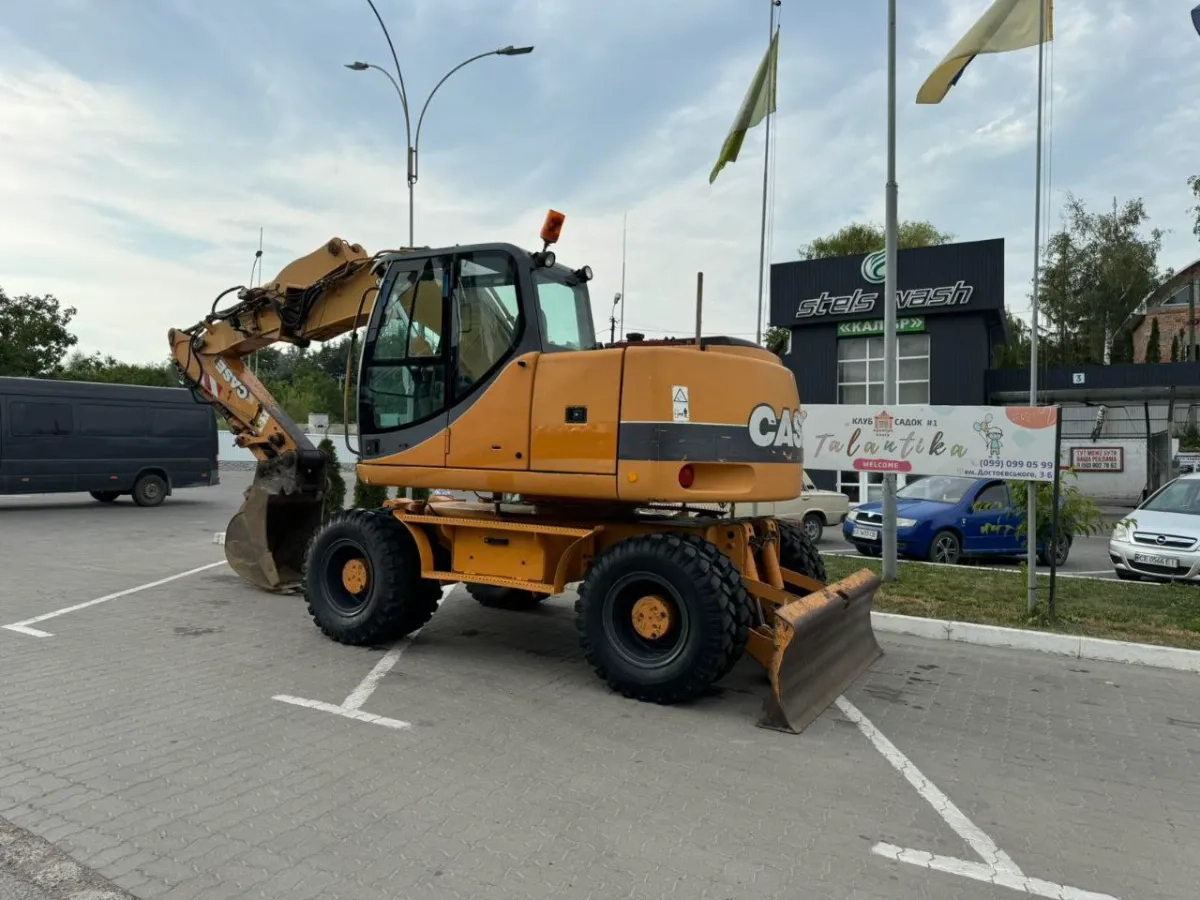 Повноповоротний екскаватор Case WX145