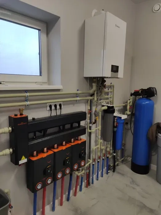 Монтаж твердопаливного котла, сантехнічні роботи