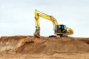 Риття котлованів екскаватором