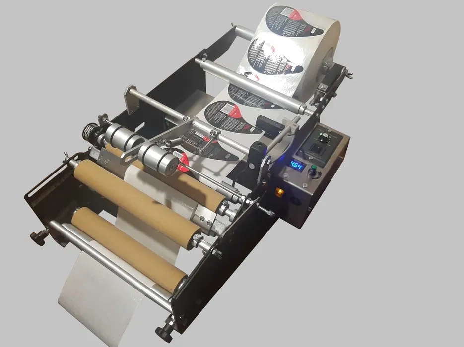 Етикетувальник 2-х етикето круглої тари ( Власне виробництво)