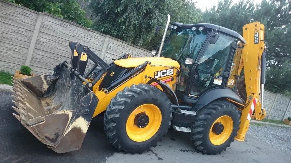 Послуги екскаватора-навантажувача