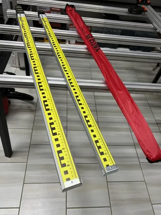 Рейка телескопічна для нівеліру алюмінієва YATO 3 та 5 метрів.