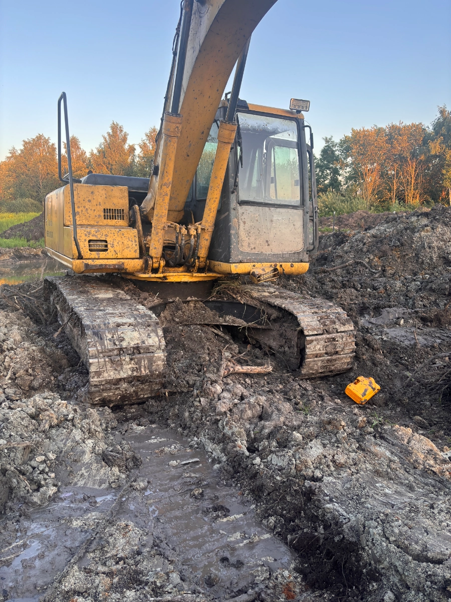 екскаватор гусеничний повноповоротний