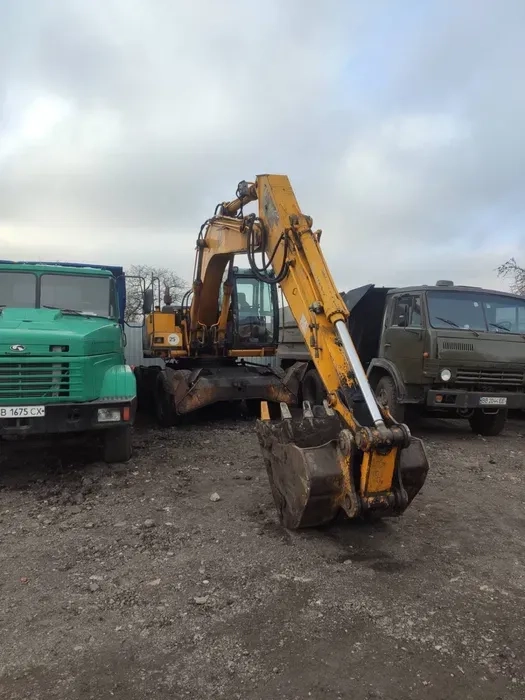 Спецтехніка маніпулятор самоскид