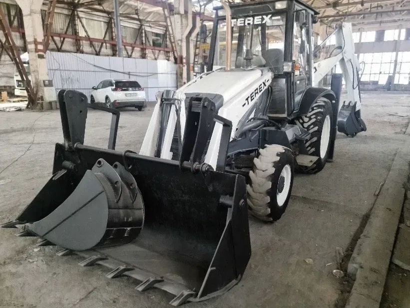 ЕКСКАВАТОР НАВАНТАЖУВАЧ