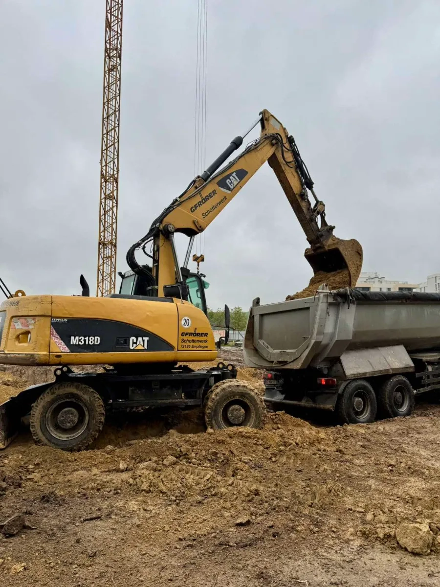 Колісний екскаватор CAT - M318