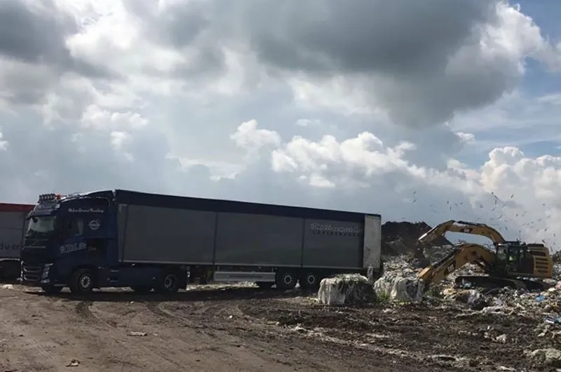 перевезення сміття відходів рухомою підлогою щеповоз