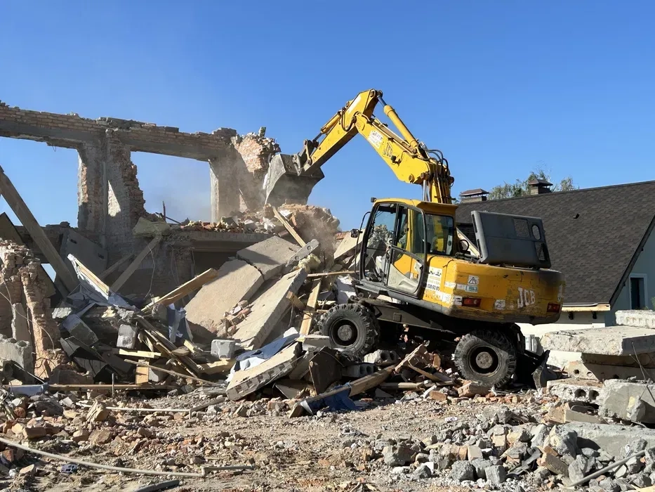 Екскаватор: копання та планування