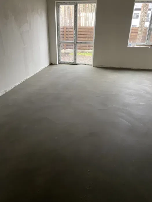 Машинна стяжка підлоги та штукатурка стін