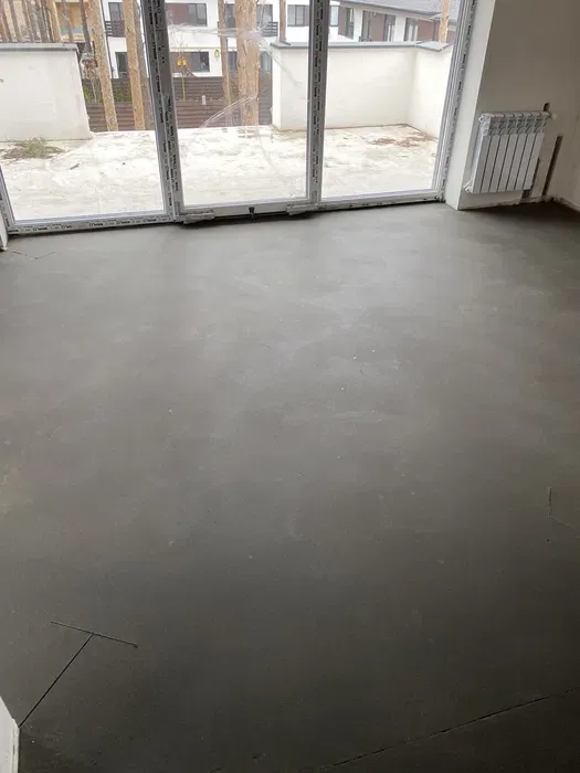 Машинна стяжка підлоги та штукатурка стін