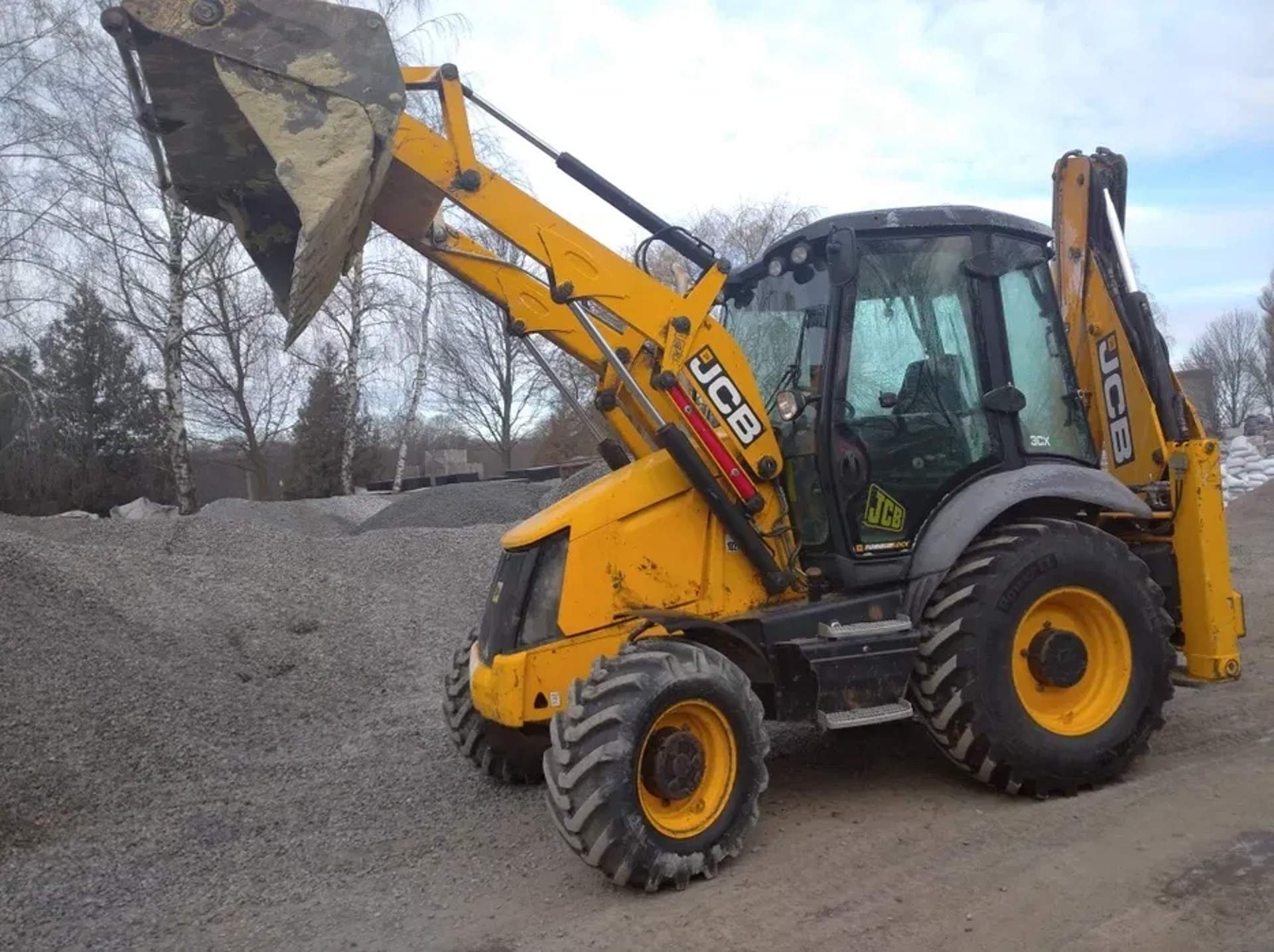 JCB 3CX універсальний екскаватор-навантажувач