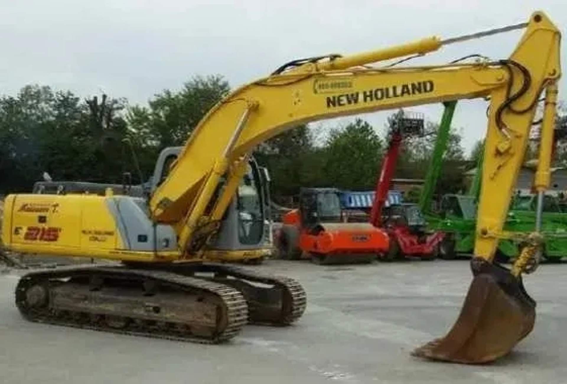 Екскаватор New Holland E215 (ковш + гідромолот)