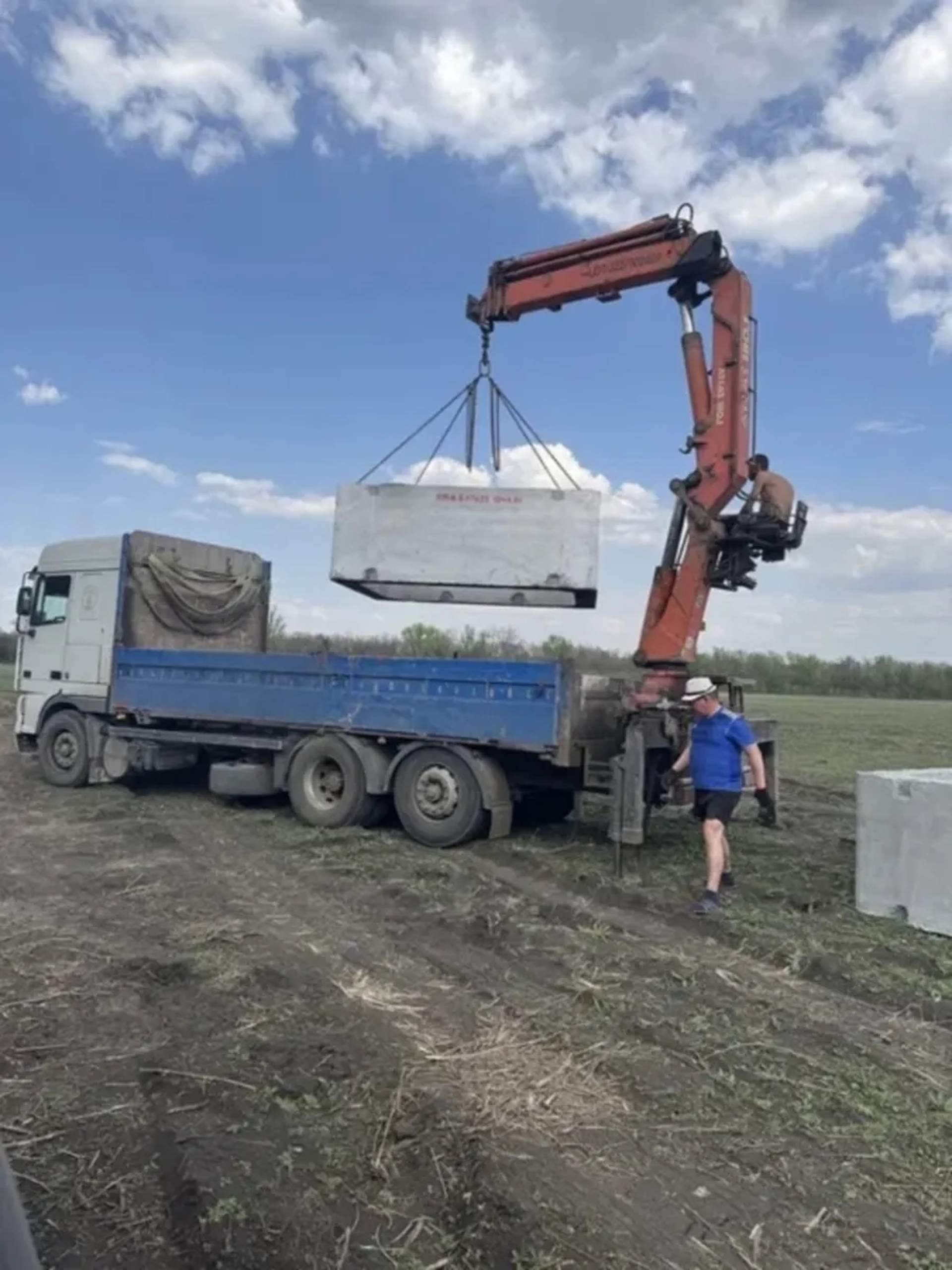 Кран - маніпулятор Atlas для важких будівельних вантажів