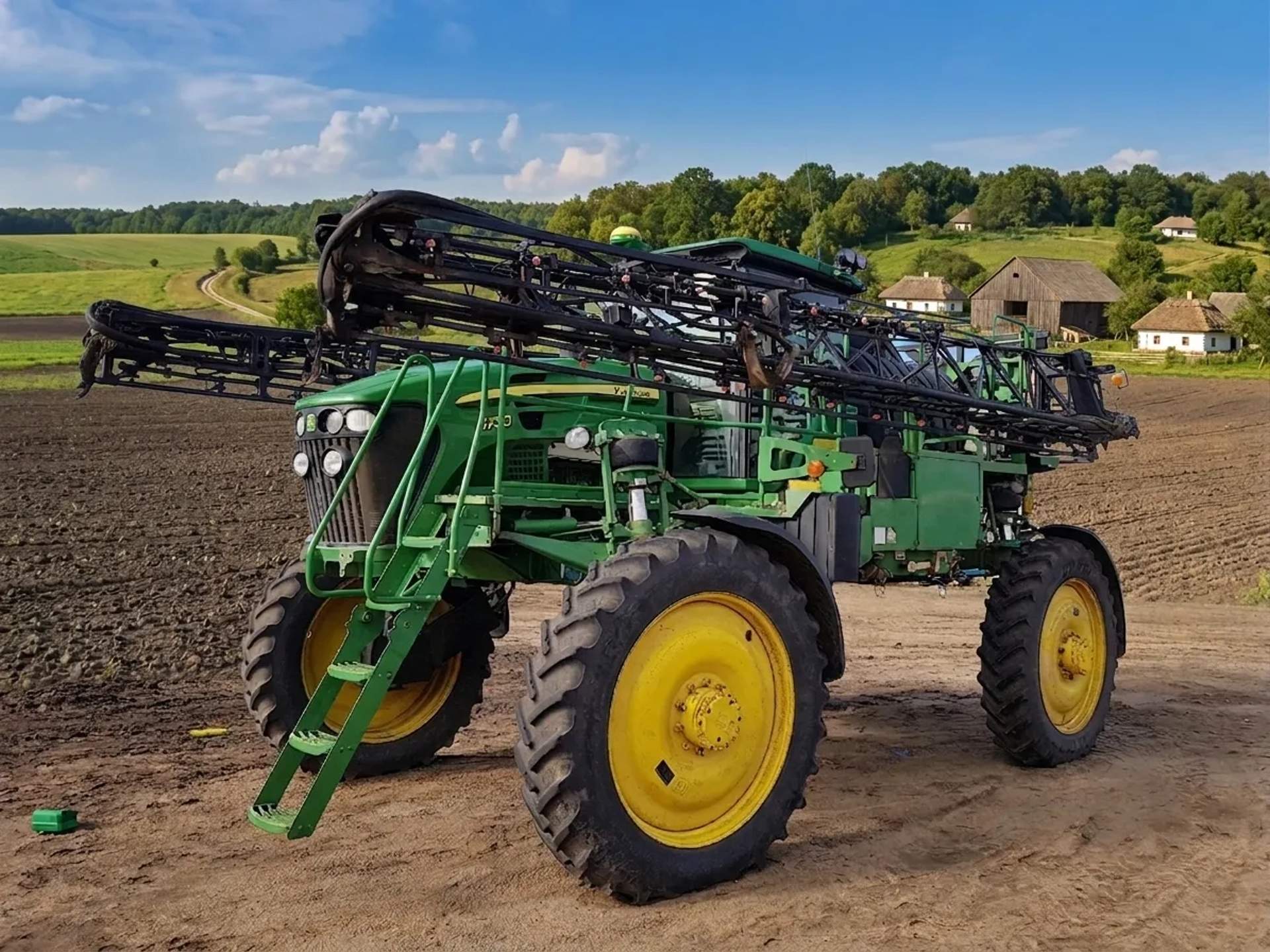 Самохідний обприскувач John Deere 4730