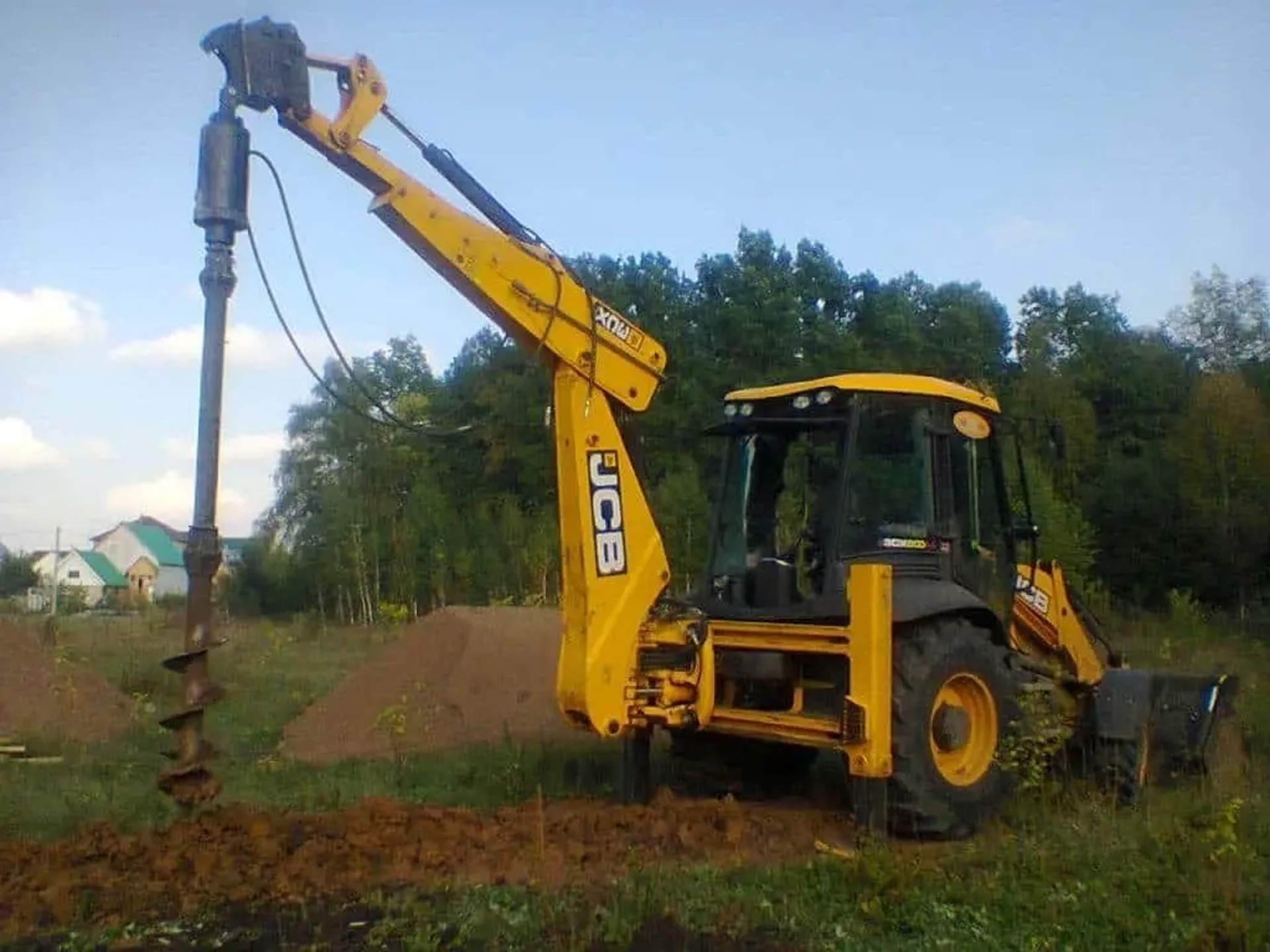 Ямобур на базі екскаватора для будівництва та огорож