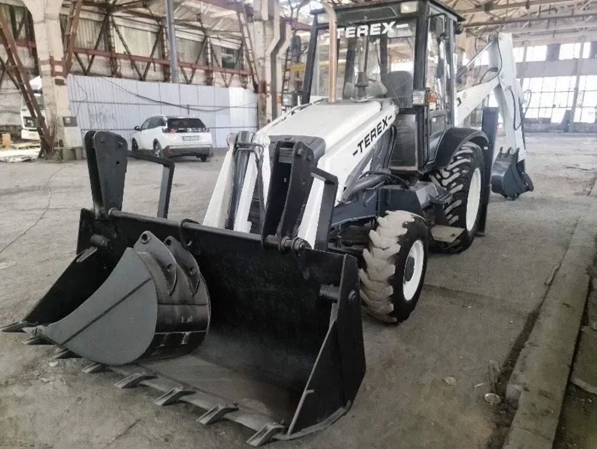 Екскаватор Навантажувач Terex TLB820