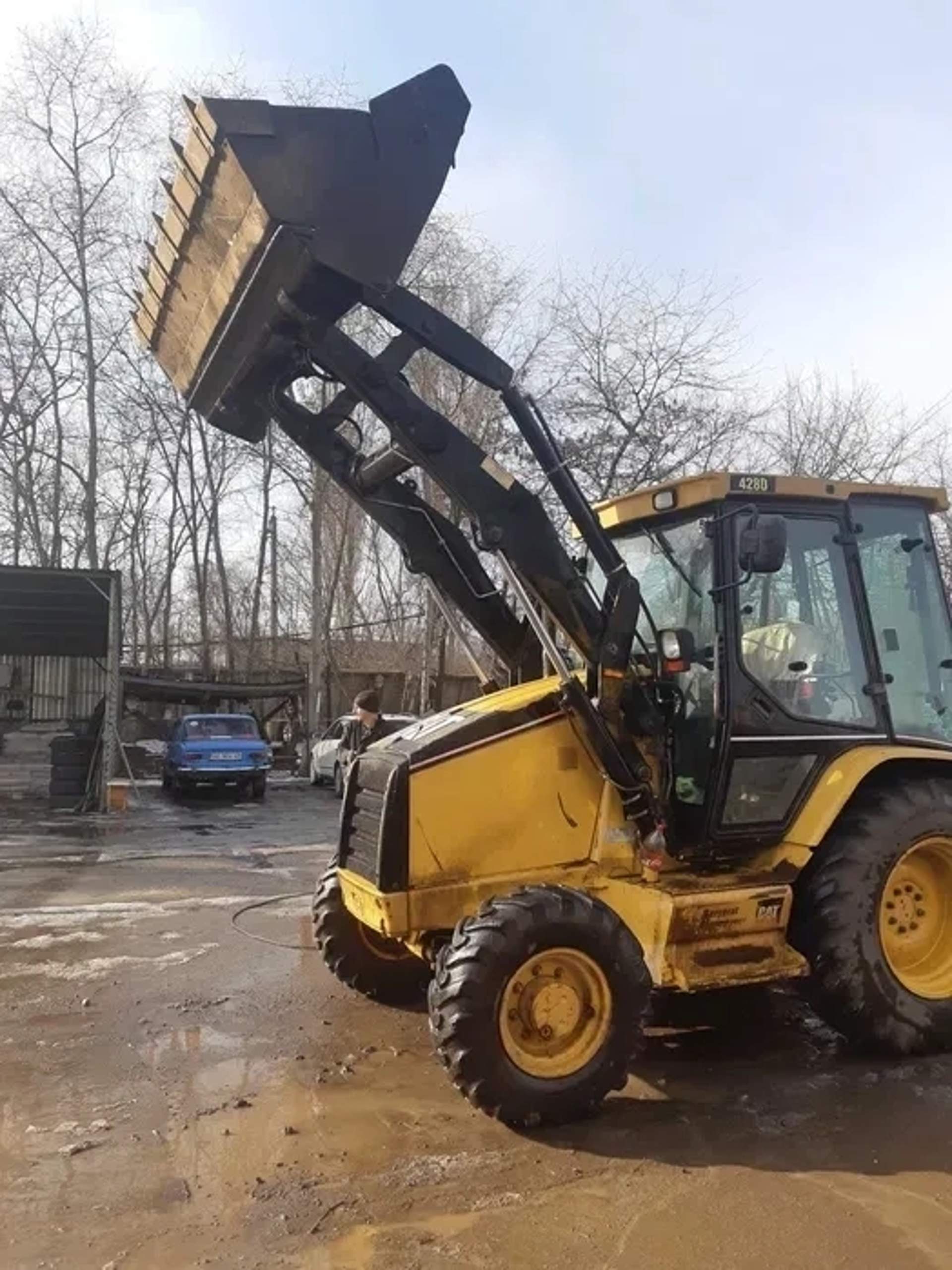 Екскаватор-навантажувач Caterpillar 428D