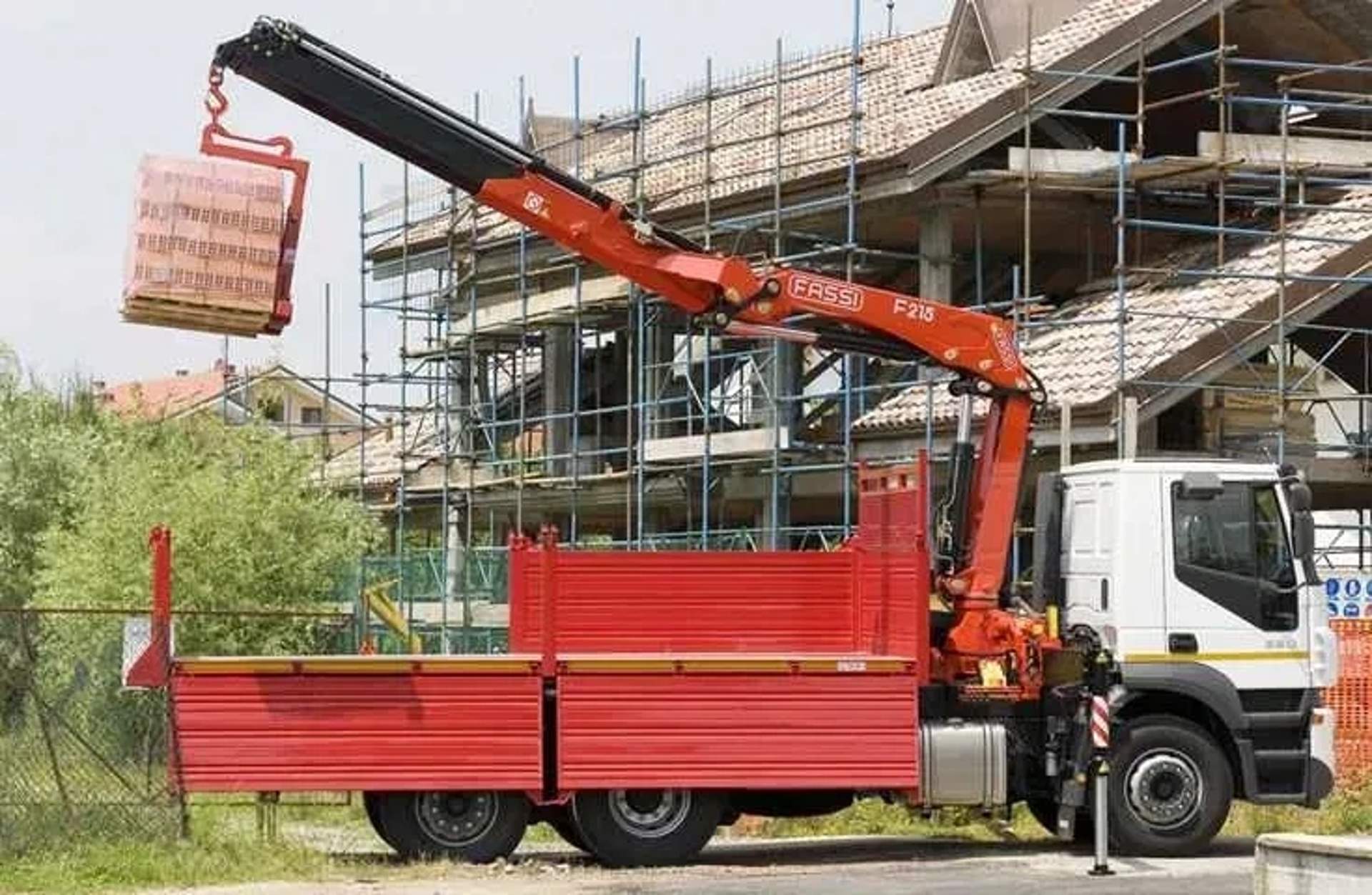 Кран-маніпулятор з потужною КМУ Fassi F215A (9 тонн)