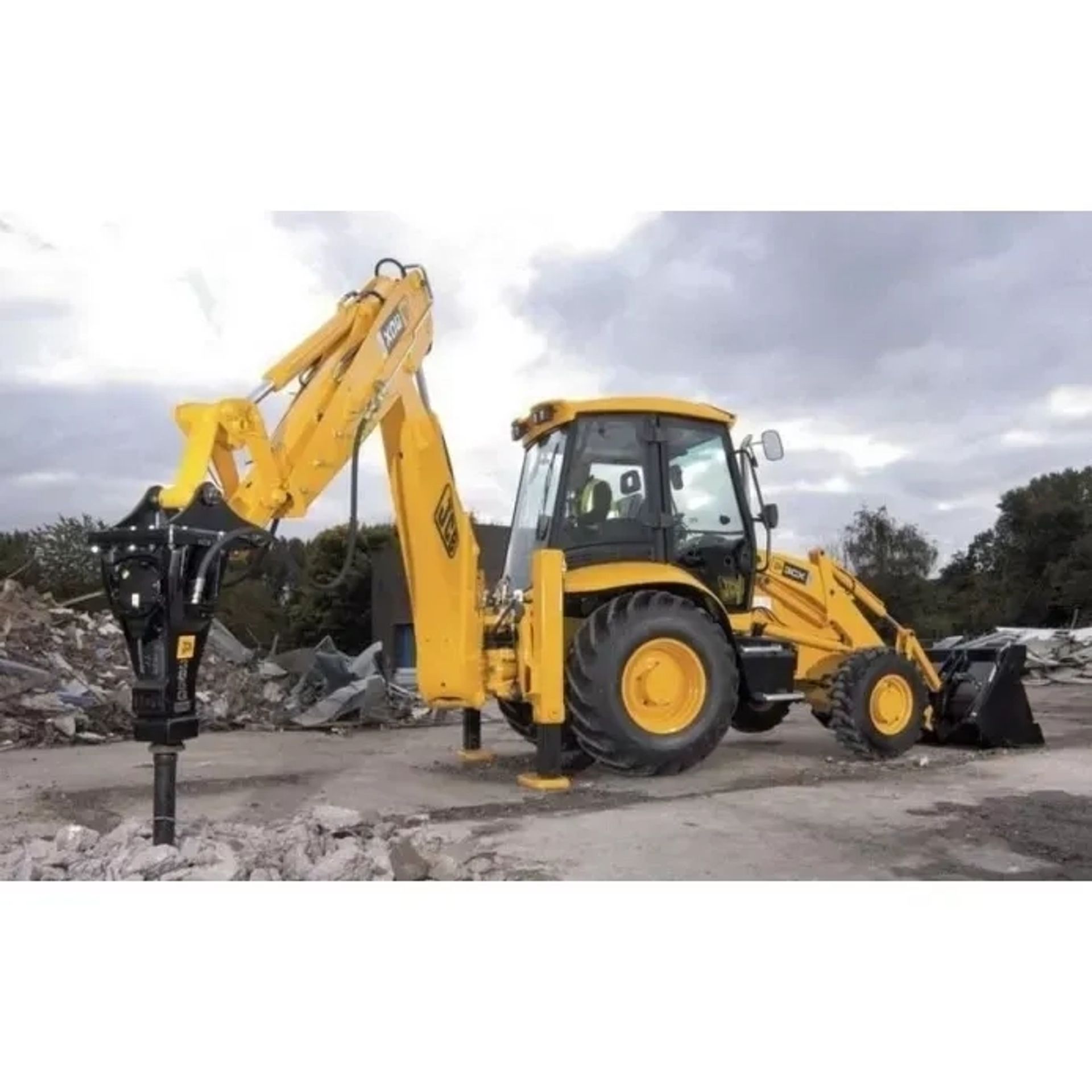 Екскаватор JCB 3cx з гідромолотом