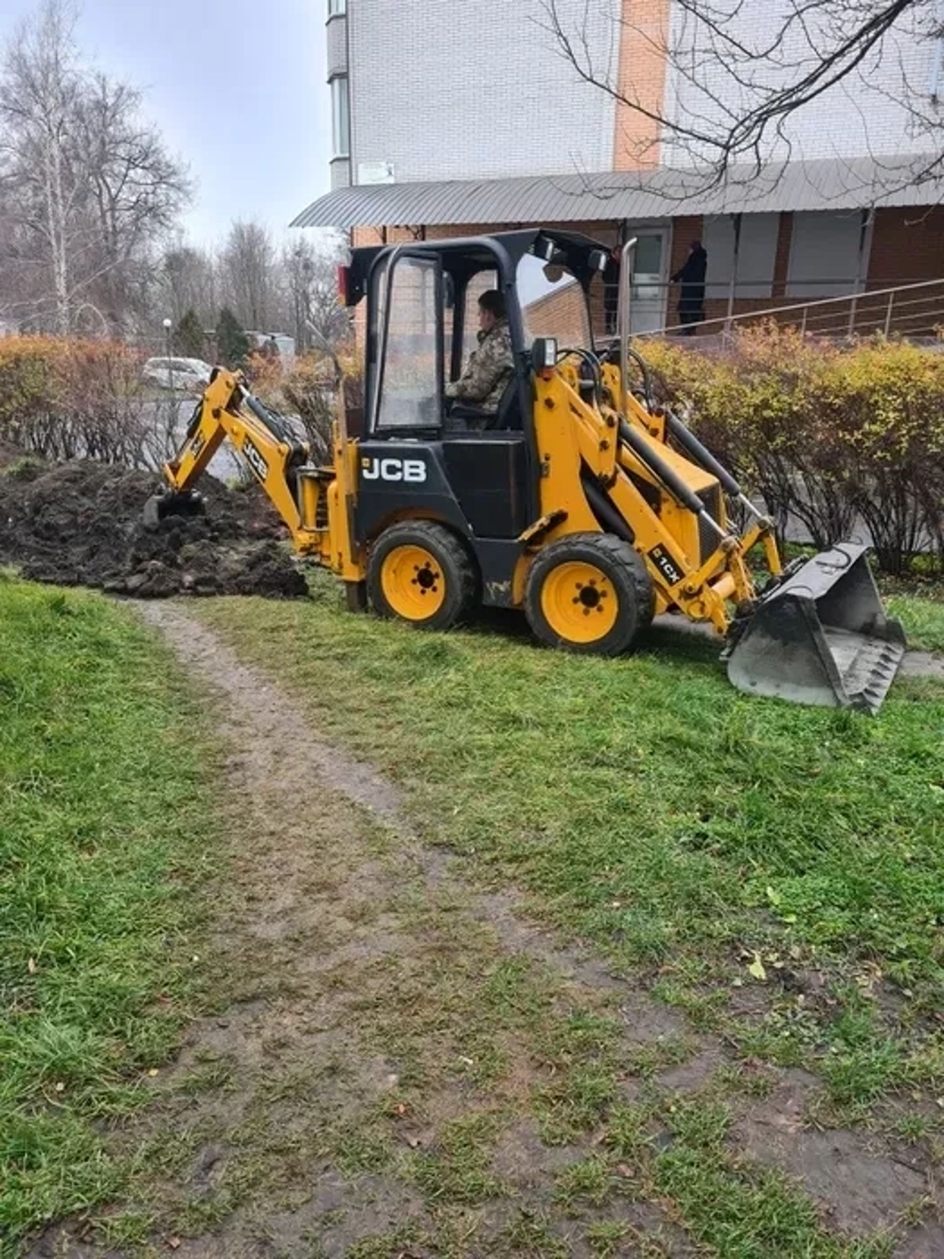 Міні-екскаватор-навантажувач JCB 1CX