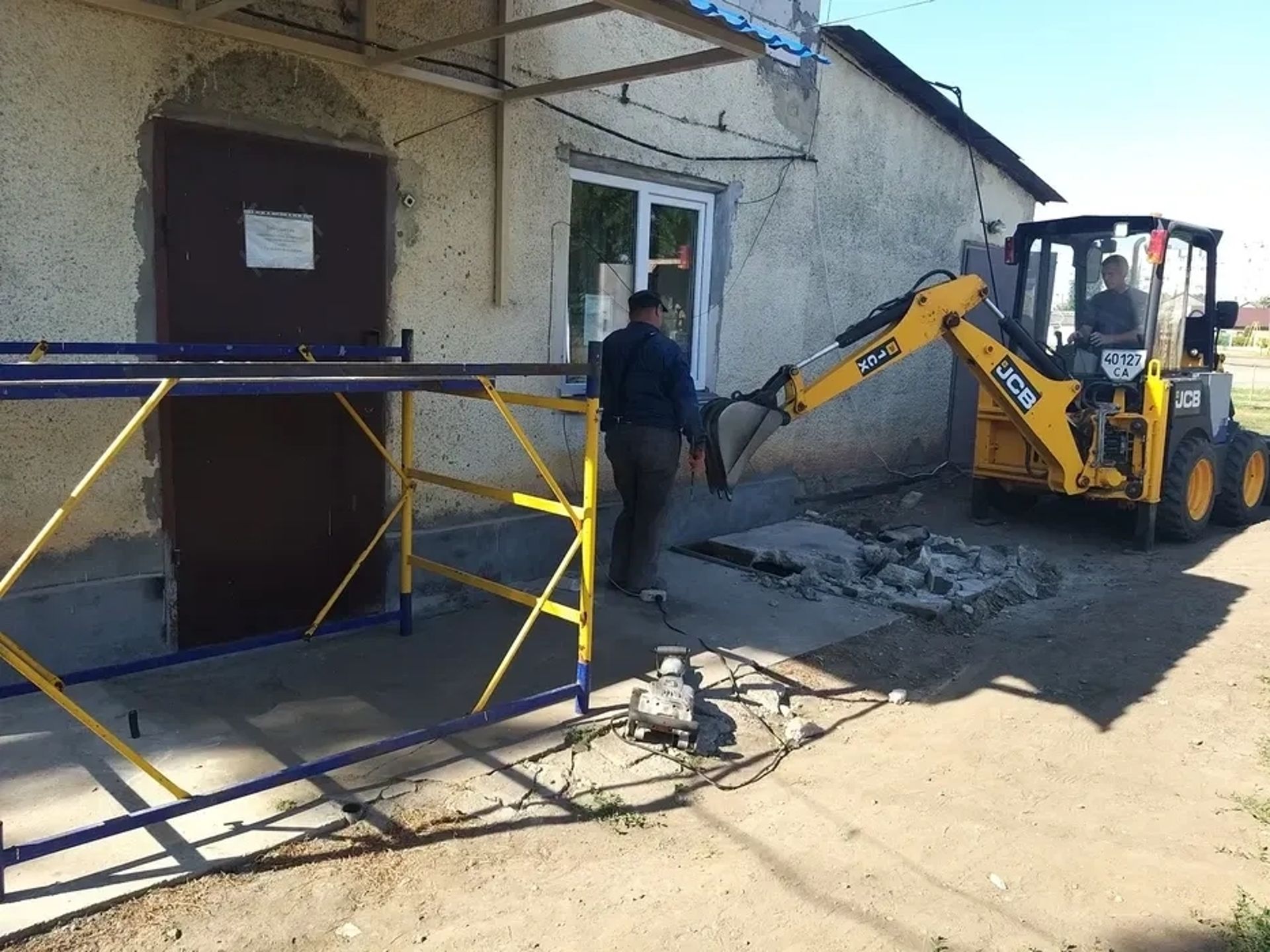 Міні-екскаватор-навантажувач JCB 1CX