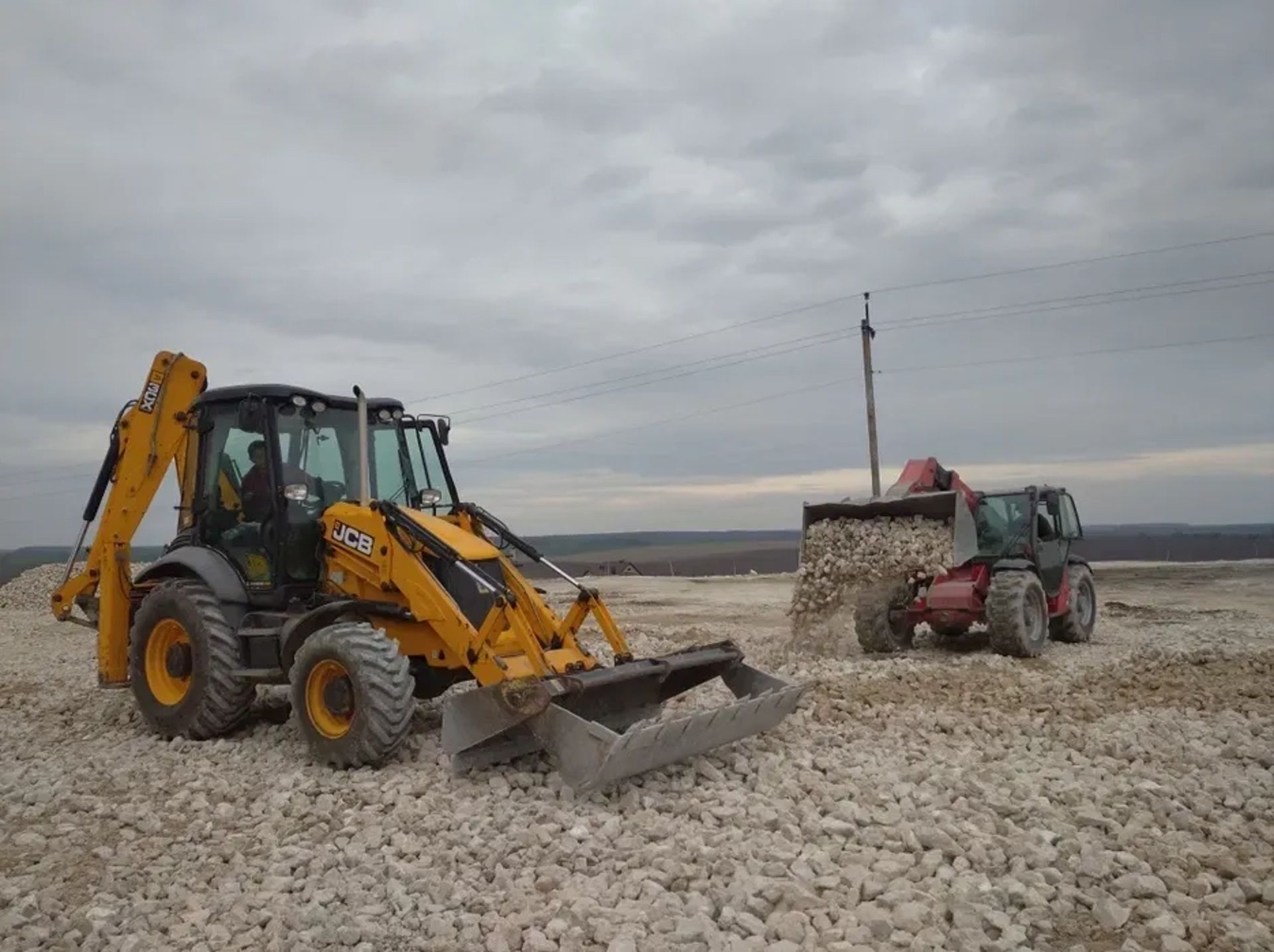 JCB 3CX універсальний екскаватор-навантажувач