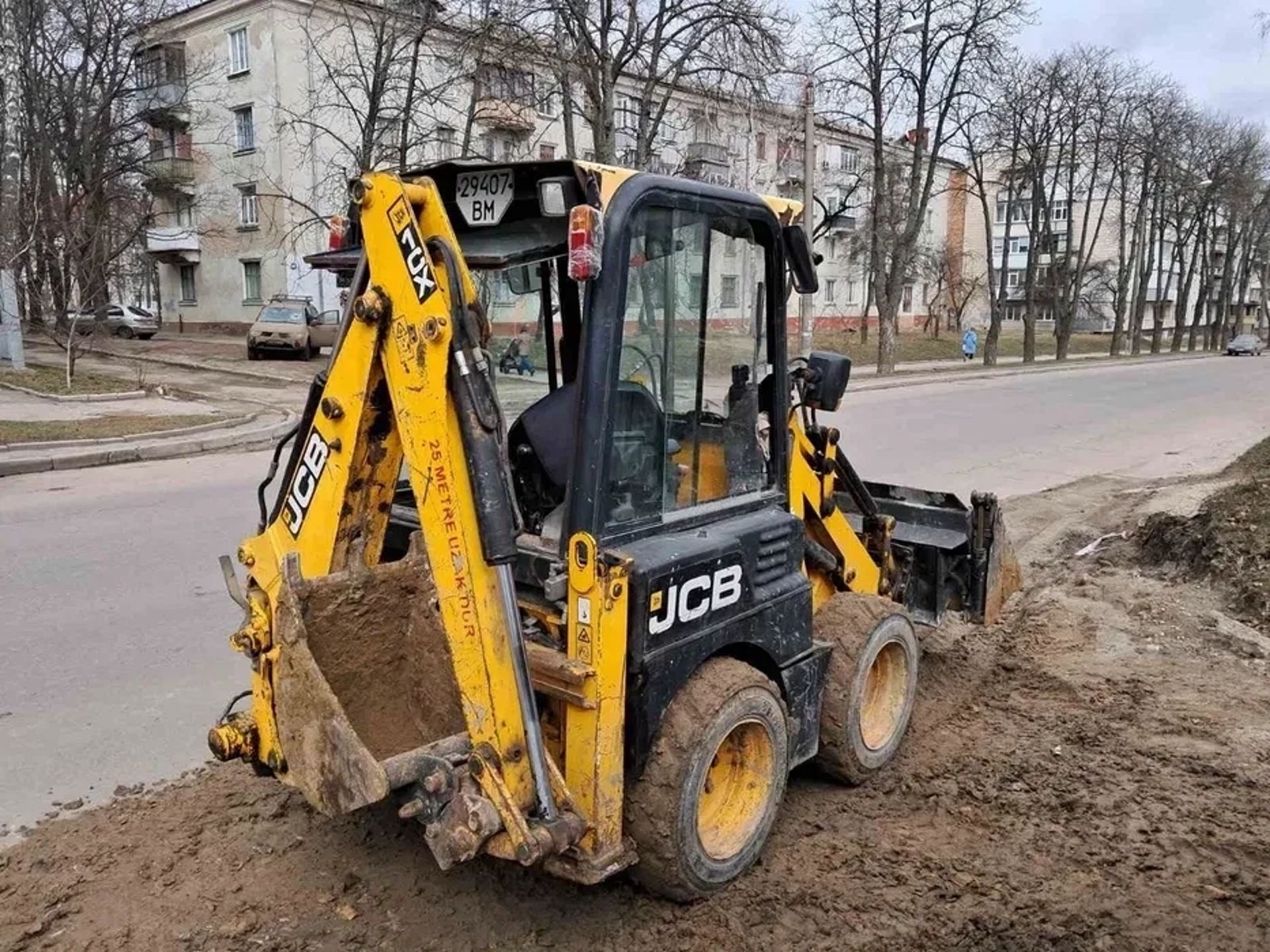 Міні-екскаватор-навантажувач JCB 1CX Земляні та навантажувальні роботи