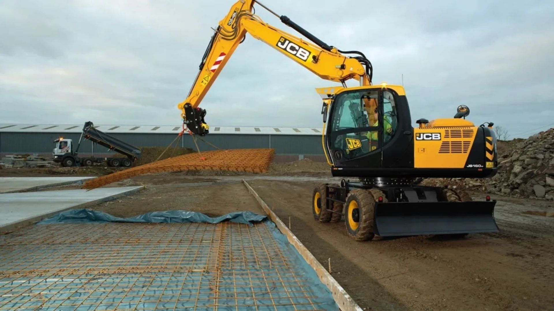 Екскаватор JCB JS 160 W для земляних робіт