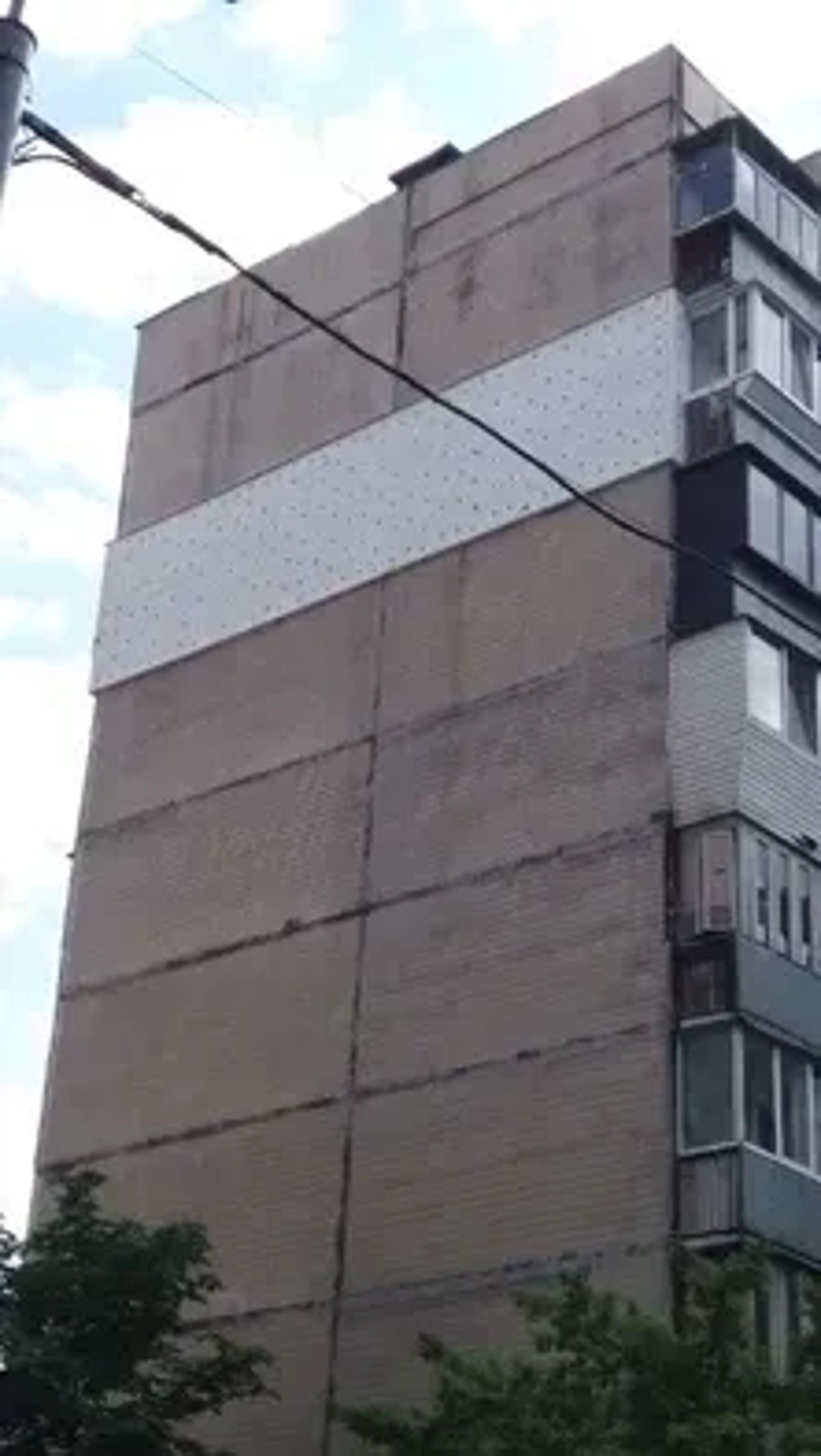 Утеплення фасадів квартир балконів будинків верхолазні роботи маляра
