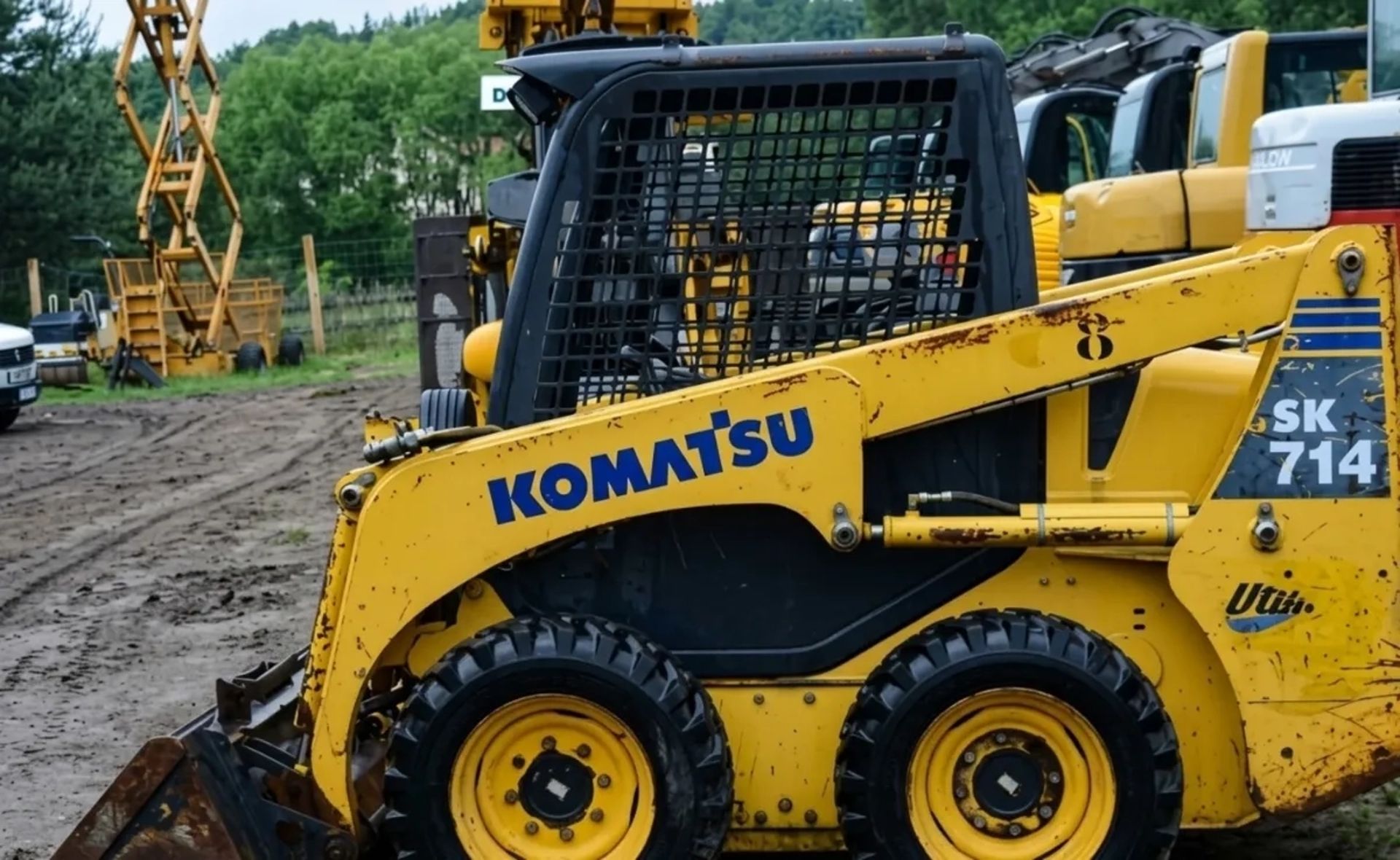 Мінінавантажувач Komatsu SK714