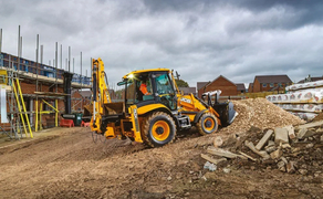 Екскаватор-навантажувач JCB ЗСХ з навісним обладнанням  гідромолотом