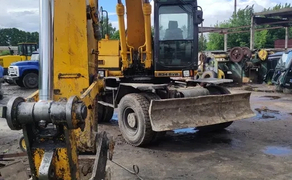 Екскаватор JCB, CAT, навантажувач KOMATSU.
