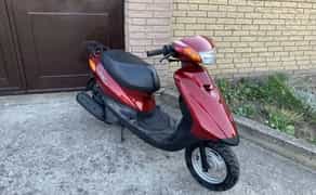 Скутер (мопед) з ручками з підігрівом