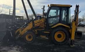 Послуги екскаватора-навантажувача для земляних та будівельних робіт