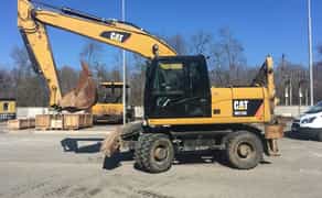 Колісний екскаватор CAT 315 Atlas