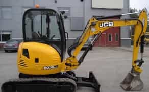 Міні-екскаватор: копання траншей, ям