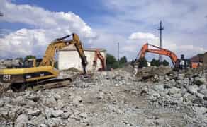 Ексковатор гусеничний з гідромолотом