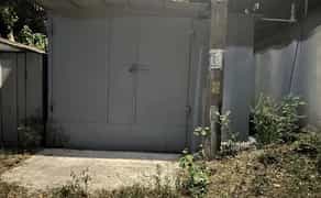 Металевий гараж, зручний заїзд