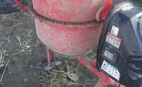 Бетонозмішувач (бетономешалка).