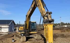 Гідромолот на Гусеничному екскаваторі