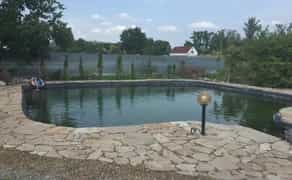 Будівництво плавальних ставків. Природні басейни. Эко пруд.