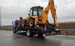 Перевезти трактор JCB 3, екскаватор, комбайн. Послуги евакуатора