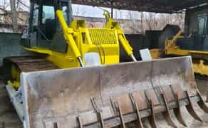 Послуги бульдозера Komatsu D65PX-12 по корчуванню пнів, дерев