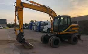 Екскаватор повно поворотнний колісний JCB-145, ківш 1 куб (додатковий планувальний ківш)