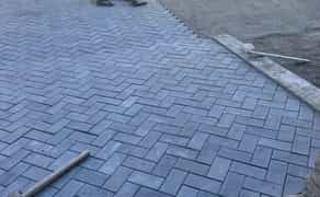 Укладання тротуарної плитки, борту, укладка бруківки.