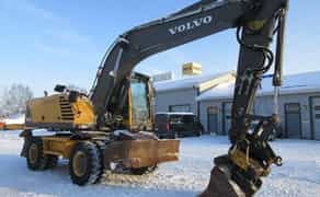 Екскаватор повно поворотнний колісний VOLVO-180, ківш 1 куб (додатковий планувальний ківш)