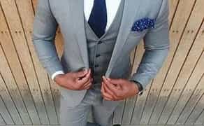 Чоловічі костюми, смокінги, фраки