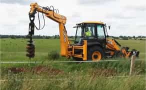 Ямобур на JCB , бурильно - кранові